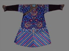 A boldly embroidered blue dragon robe