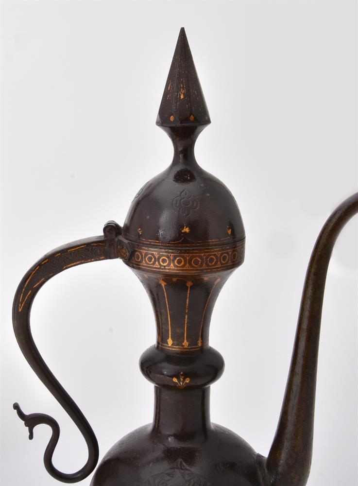 Three Qajar damascened and engraved steel ewers - Image 4 of 15