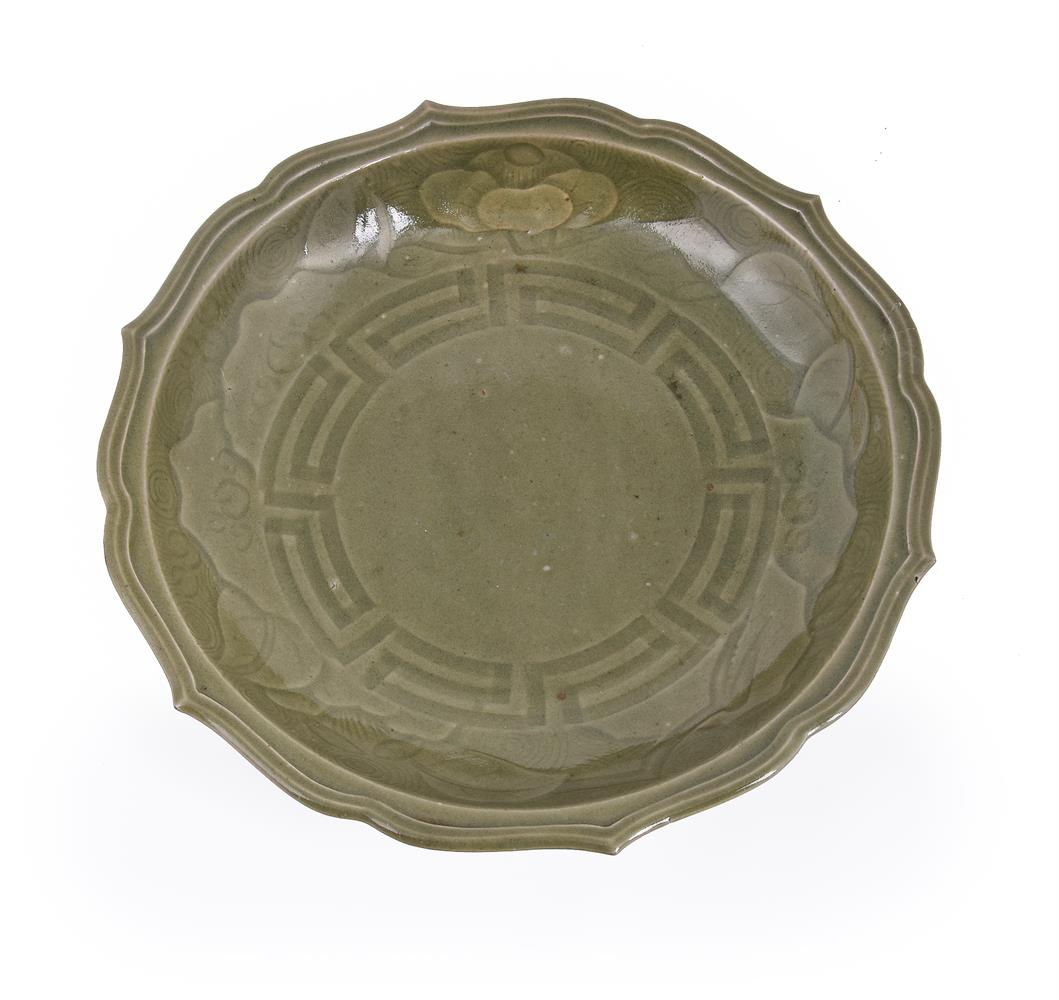 A Japanese Arita Celadon Dish of circular form within the barbed