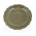 A Japanese Arita Celadon Dish of circular form within the barbed