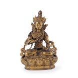 A Sino-Tibetan gilt-bronze figure of Vajradhara