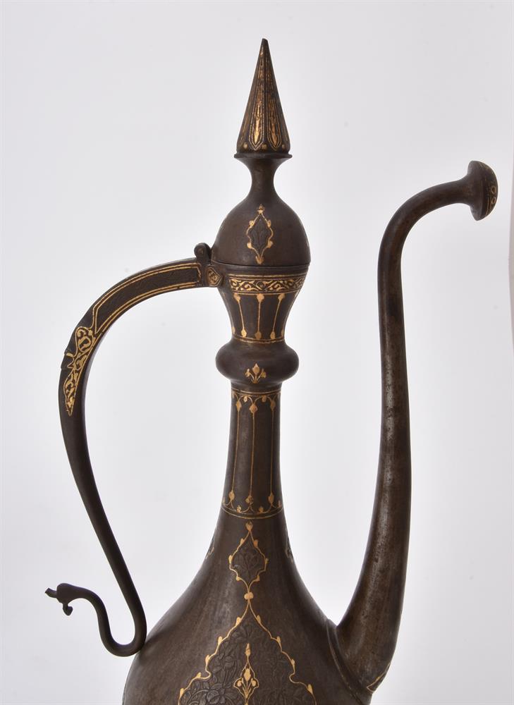 Three Qajar damascened and engraved steel ewers - Image 7 of 15