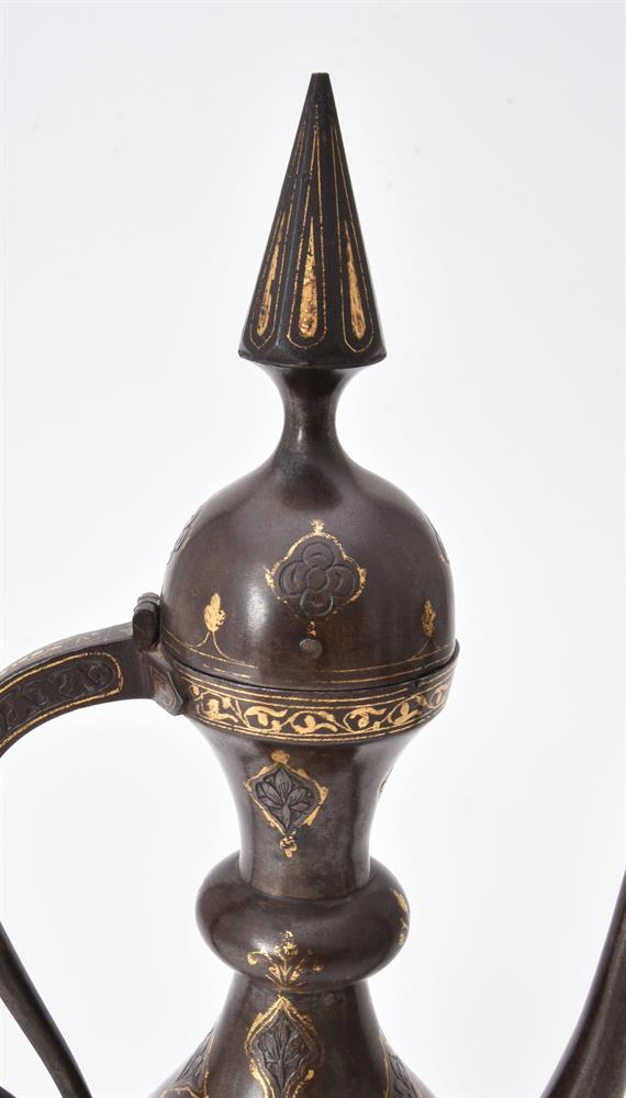 Three Qajar damascened and engraved steel ewers - Image 12 of 15