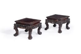 A pair of Chinese carved hardwood square stands