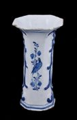 A Dutch Delft blue and octagonal section trumpet vase