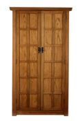 A pair of elm wardrobes