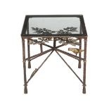 A gilt and patinated metal table