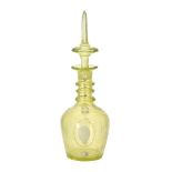 A pale yellow tint decanter and spier shaped stopper