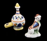 A Staffordshire pearlware model of a sphinx of Pratt Family type