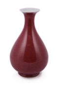 A Chinese red-glazed yuhuchun vase