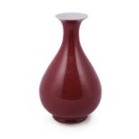 A Chinese red-glazed yuhuchun vase