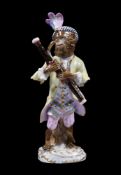 A Meissen monkey-band model of the bassoon player