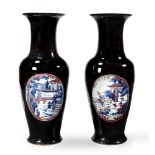 A large pair of Chinese black glazed baluster vases