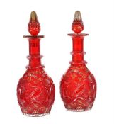 A pair of ruby-flashed decanters and stoppers for the Near Eastern market