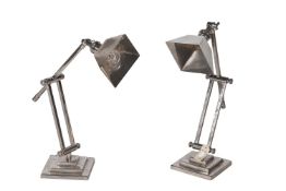 A pair of chrome desk lamps