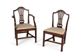 A set of eight George III mahogany dining chairs