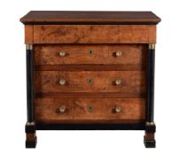 A Louis Philippe walnut and ebonised commode