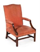 A mahogany and upholstered library chair