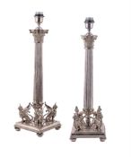 A pair of silver plated columnar table lamps in Neoclassical taste