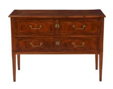 A French walnut and marquetry inlaid commode