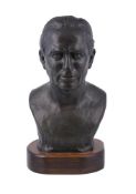 A bronzed composition bust of Edward Johnson