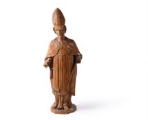 A South German sculpted softwood model of a Bishop Saint