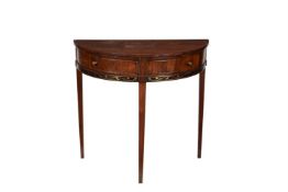 A mahogany, ebonised and brass inlaid side table