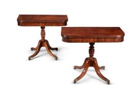 A pair of Regency mahogany tea tables