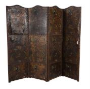 An embossed and polychrome painted leather four fold room screen