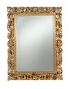A carved giltwood mirror in Florentine style