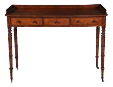 A George IV mahogany galleried side or hall table