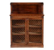 A Regency mahogany and ebonised strung side cabinet