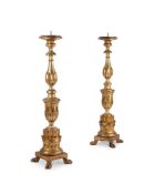 A pair of giltwood pricket sticks or torchere stands