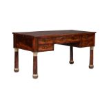 A Louis Philippe mahogany and gilt metal mounted writing table