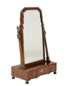 A walnut platform dressing table mirror in early 18th century style