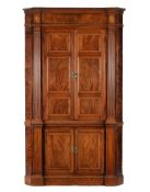 A George III mahogany corner cupboard