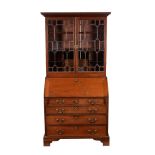 A George III mahogany and line inlaid bureau bookcase