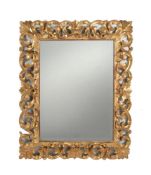 A carved giltwood wall mirror