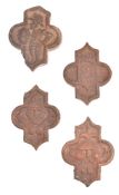 Set of four terracotta medieval tiles