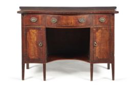 A George III mahogany, line inlaid and crossbanded serpentine fronted side table