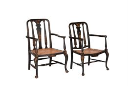 Two lacquer and parcel gilt open arm chairs