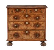 A William & Mary walnut and seaweed marquetry chest of drawers