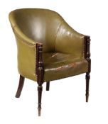 A mahogany and leather upholstered armchair