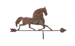 A patinated metal weathervane