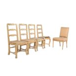 A set of four cream and polychrome painted side chairs