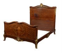 A mahogany, parquetry and gilt metal mounted bed frame, in Louis XVI style