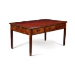 A George III mahogany and tooled leather inset library table