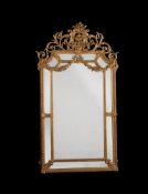 A giltwood and composition wall mirror