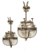 An unusual pair of Empire ormolu corner sconces