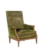A Louis XV/LVI transitional walnut and green velvet upholstered armchair